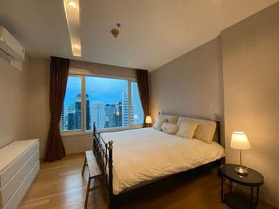 Siri at Sukhumvit — Renovated City-View Home | Direct BTS Skywalk photo 2